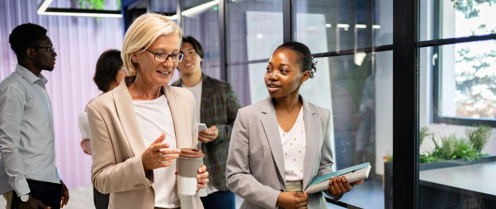 Staff Sense team members collaborating in a bright modern office